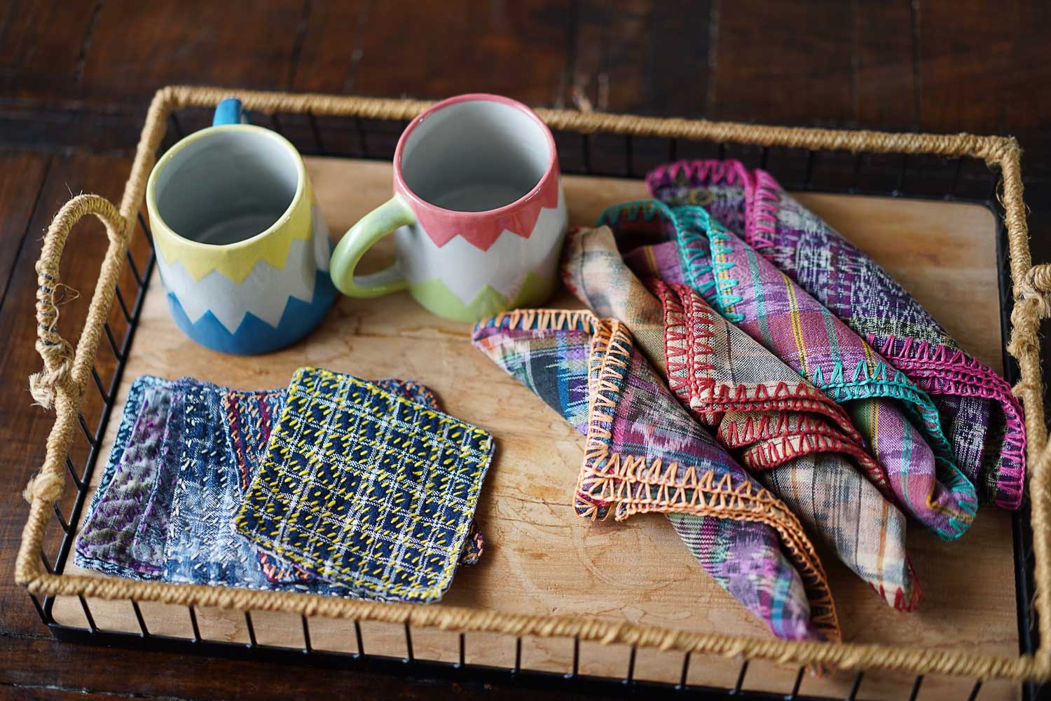 Hand-embroidered Corte Napkins: Light Indigo on blue (set of 4)