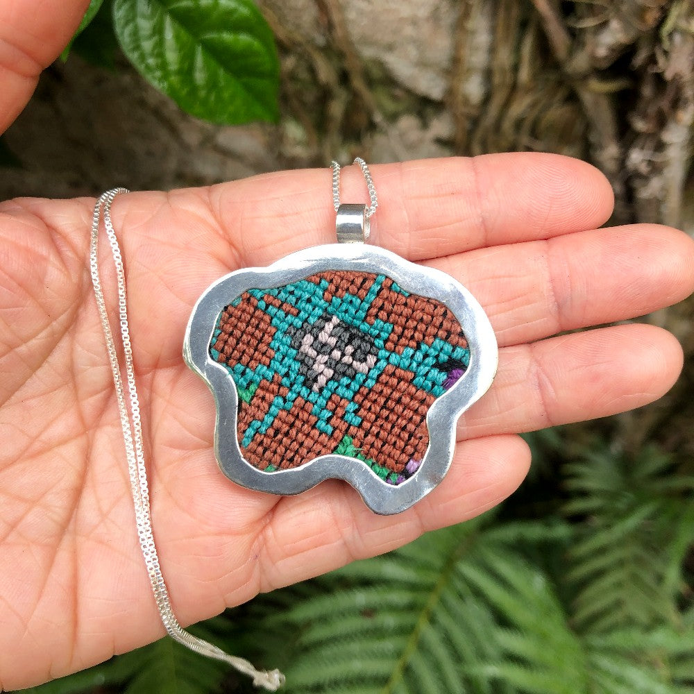 Silver Textile Pendant: Orange and Turquoise Flower 1