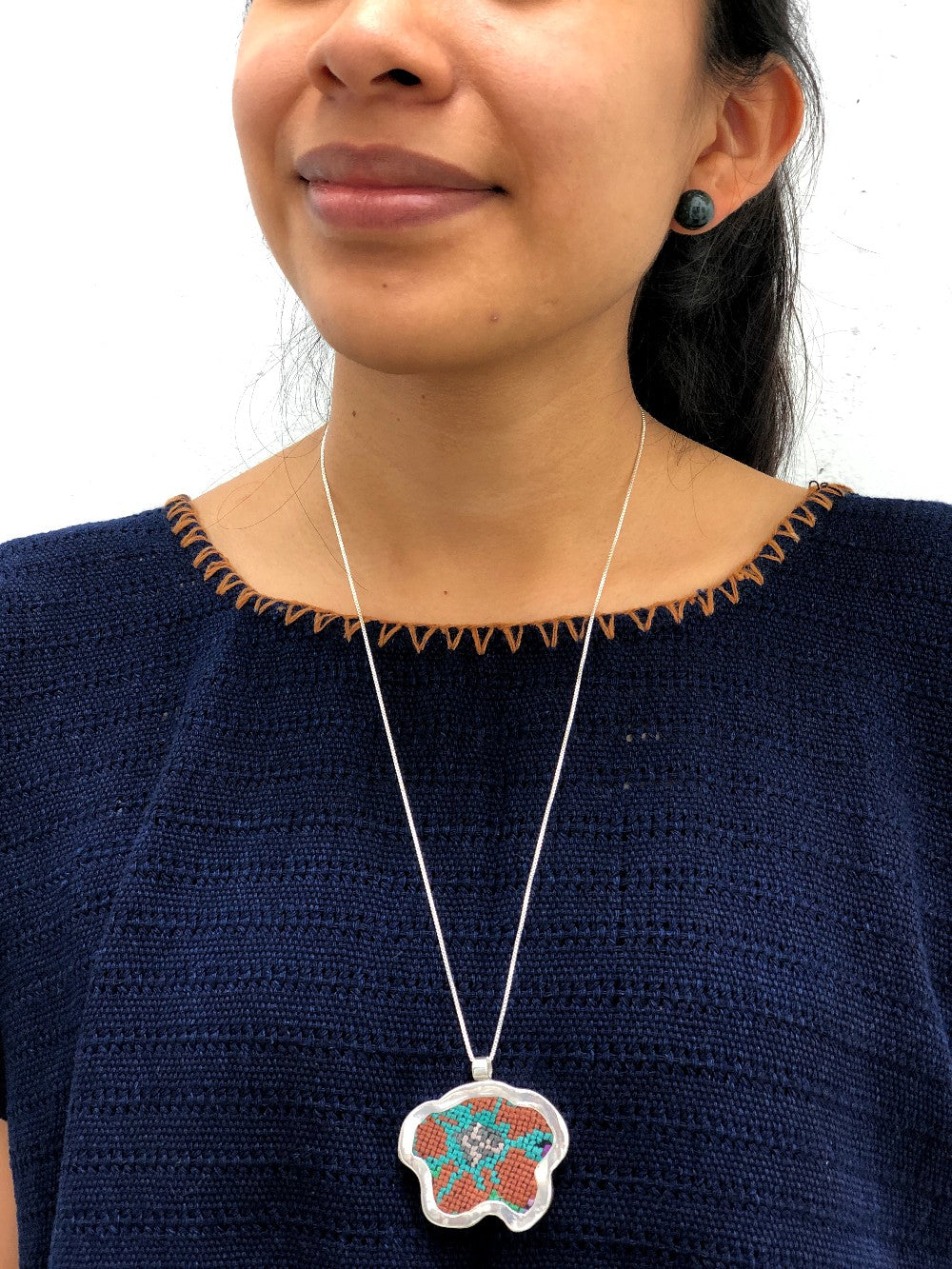 Silver Textile Pendant: Orange and Turquoise Flower 1