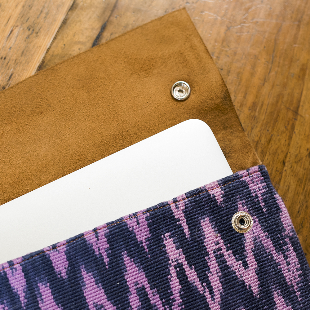 Handmade laptop sleeve with textile and leather