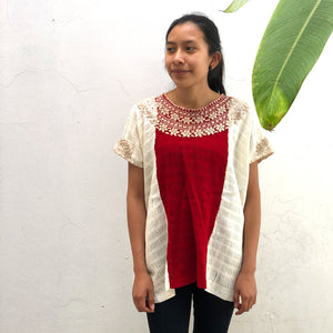 Model wearing beige and red base woven blouse with embroidery french knot neckline reference picture
