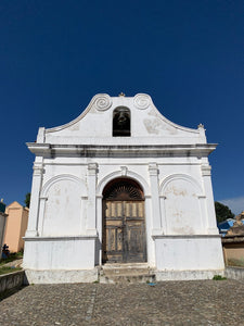 A white chapel at the Chichicastenango cemetery