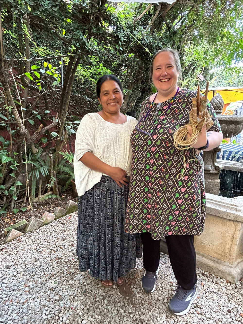 Teacher and student smiling together at the end of the week