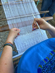 Detailed view of the iconic duck motifs woven into a traditional Pikbil textile.