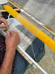 Close up of the woven motifs featured in the Pikbil technique, showcasing the traditional duck designs characteristic of this textile tradition.