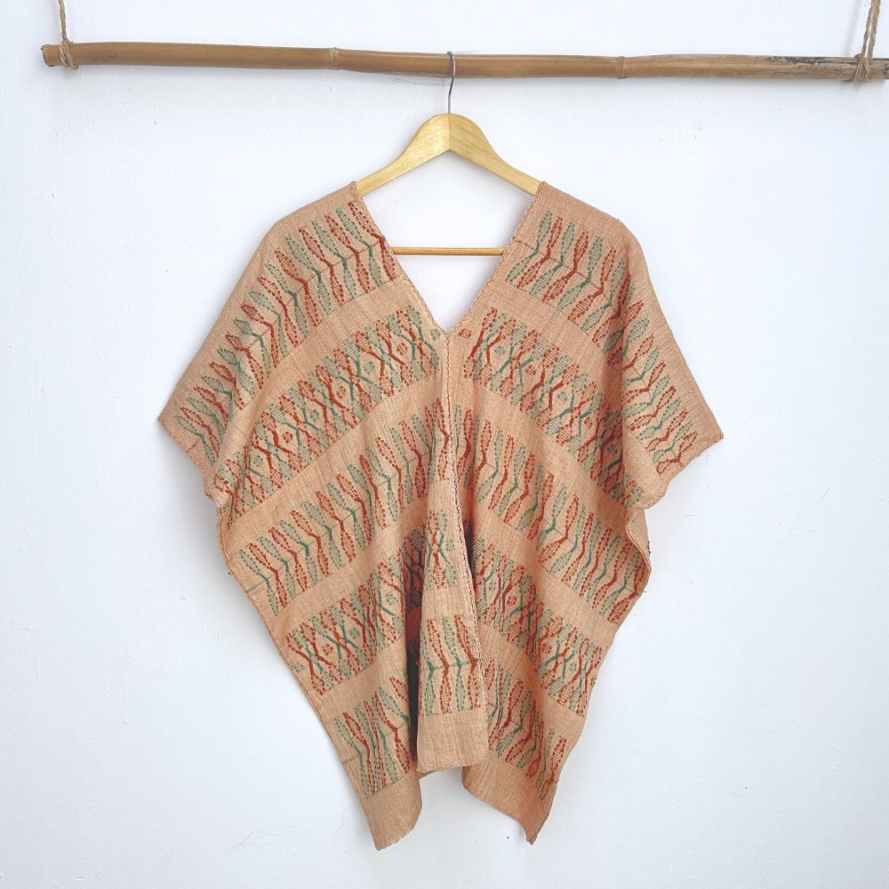 Two-panel blouse in beige coconut color with handspun threads, brocade figures of leaves.