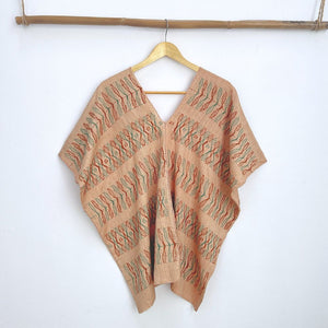 Two-panel blouse in beige coconut color with handspun threads, brocade figures of leaves.