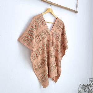 Two-panel blouse in beige coconut color with handspun threads, brocade figures of leaves.