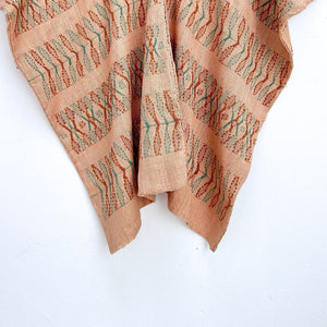 Two-panel blouse in beige coconut color with handspun threads, brocade figures of leaves.