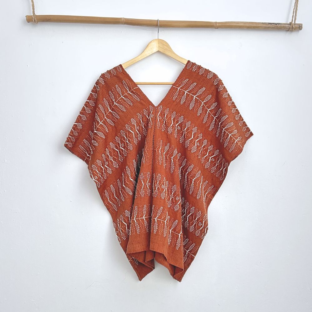 Two-panel blouse in soft brown with handspun threads, brocade figures of leaves.