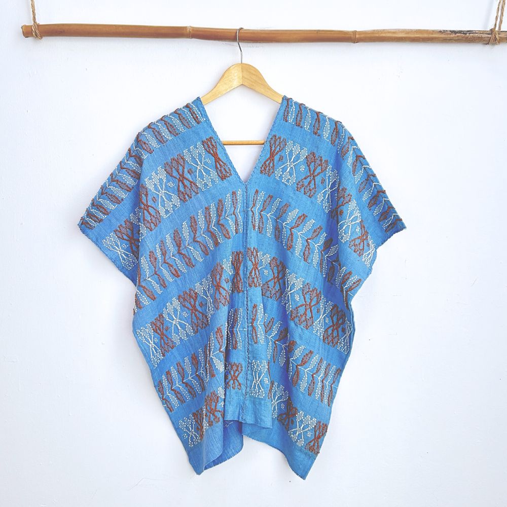 Two-panel blouse in sky blue color with handspun threads, brocade figures of leaves.