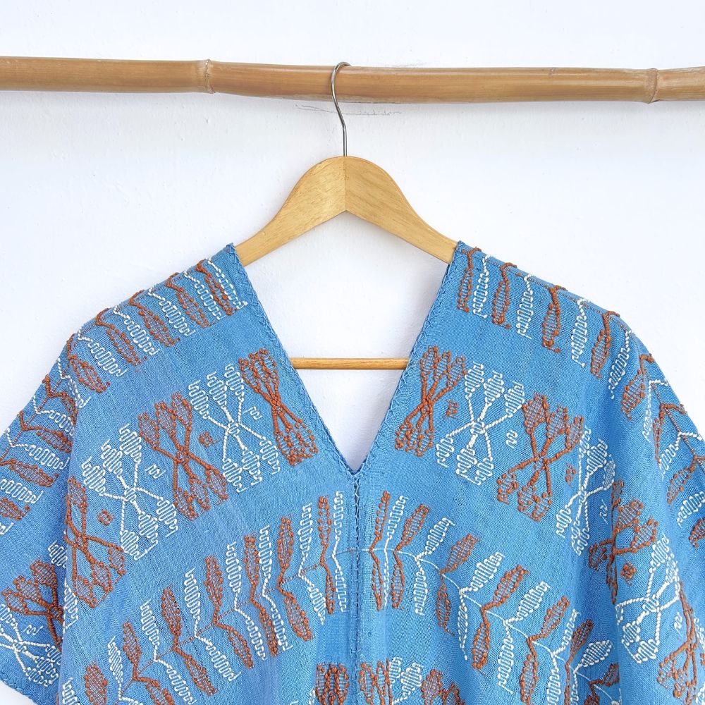 Two-panel blouse in sky blue color with handspun threads, brocade figures of leaves.