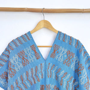 Two-panel blouse in sky blue color with handspun threads, brocade figures of leaves.
