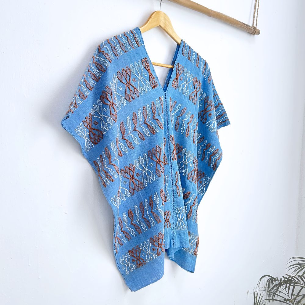Two-panel blouse in sky blue color with handspun threads, brocade figures of leaves.