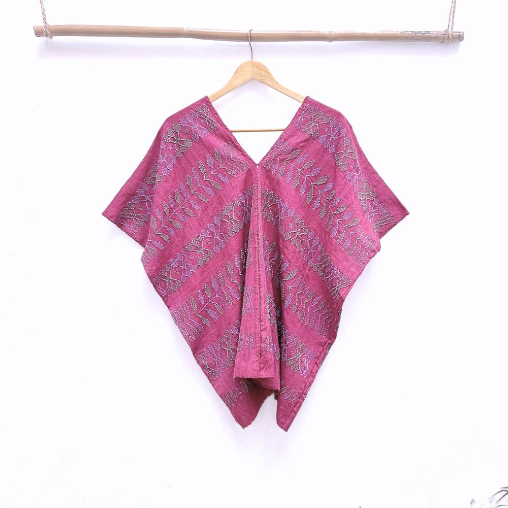 Two-panel blouse in soft magenta color with handspun threads, brocade figures of leaves.