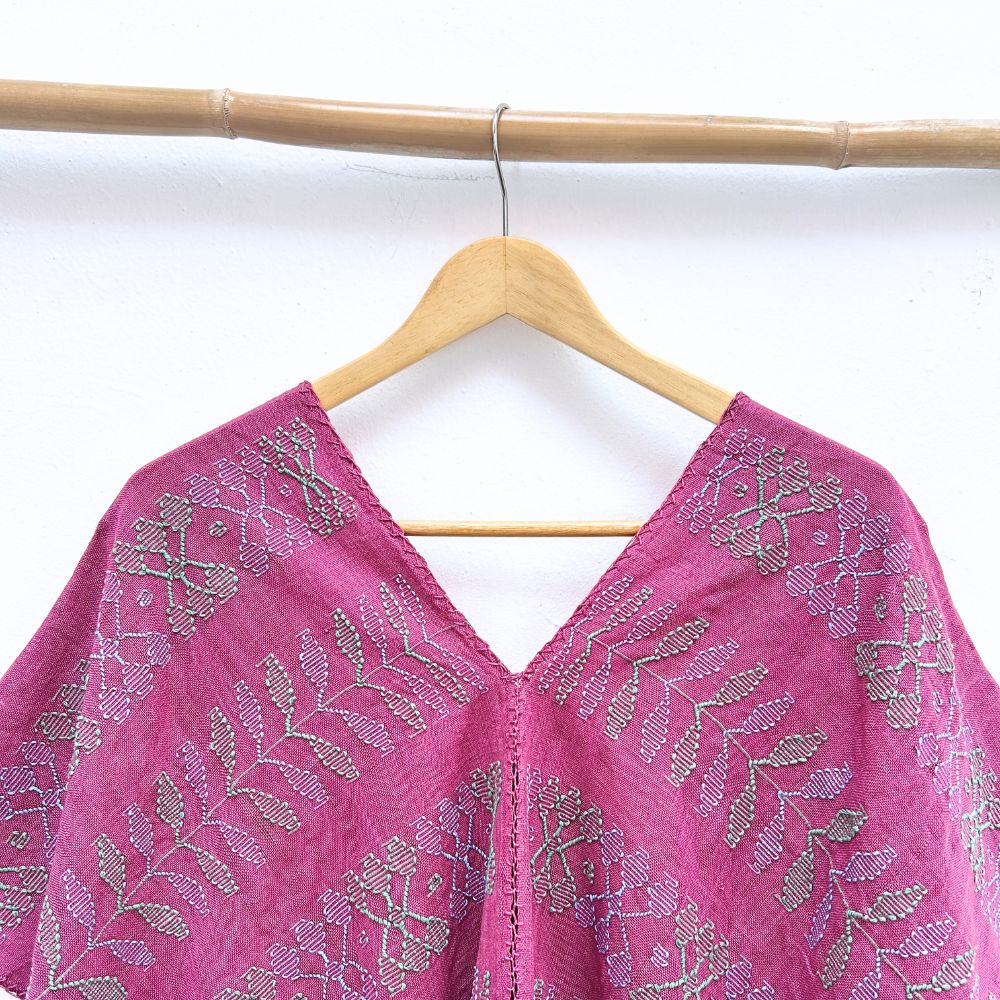 Two-panel blouse in soft magenta color with handspun threads, brocade figures of leaves.
