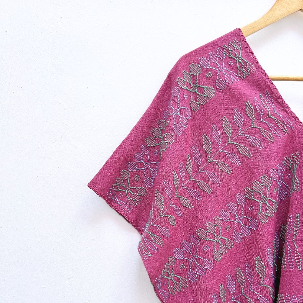 Two-panel blouse in soft magenta color with handspun threads, brocade figures of leaves.