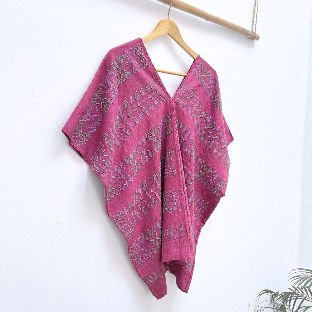 Two-panel blouse in soft magenta color with handspun threads, brocade figures of leaves.