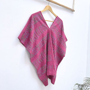 Two-panel blouse in soft magenta color with handspun threads, brocade figures of leaves.