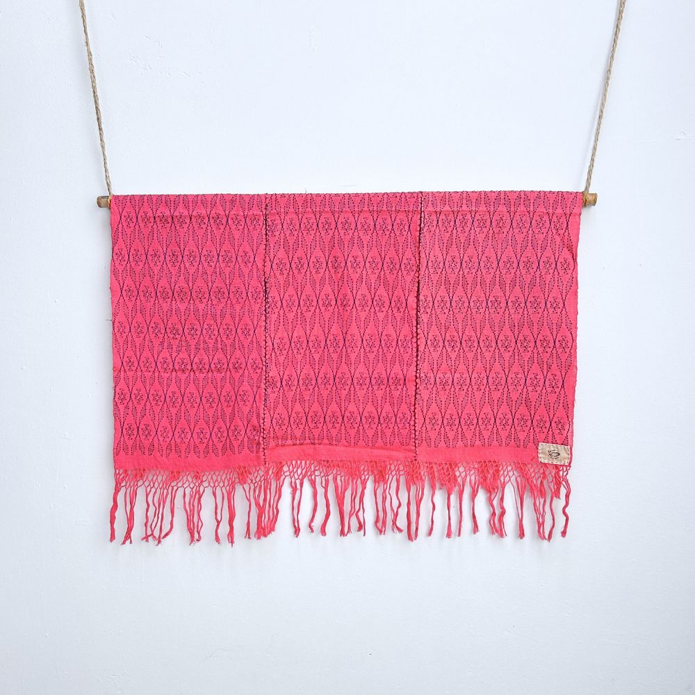Cochineal Pink woven shawl with fringe on a white background