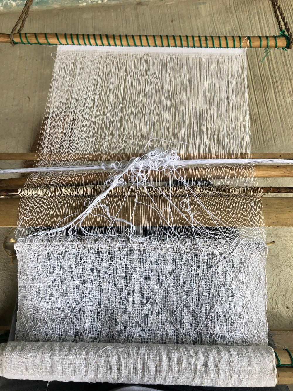 A pikbil loom in white