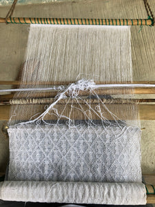 A pikbil loom in white