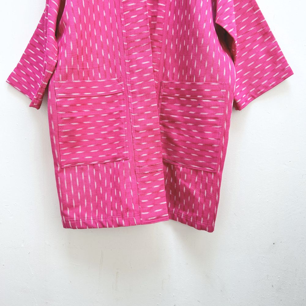 Pink patterned jacket on a white background
