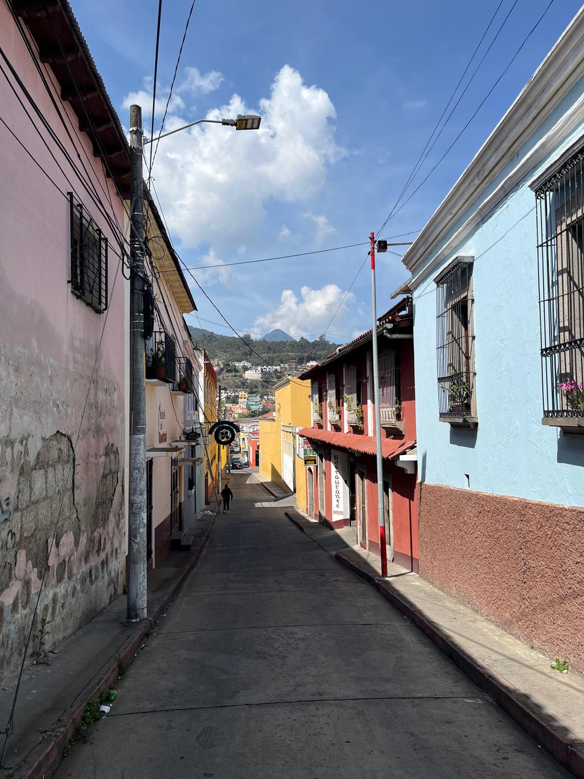 Colorful street scene with buildings and a clear sky
