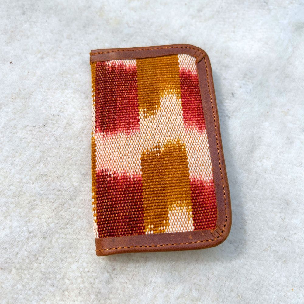 Red, white and ochre pattern  textile cardholder with brown leather 