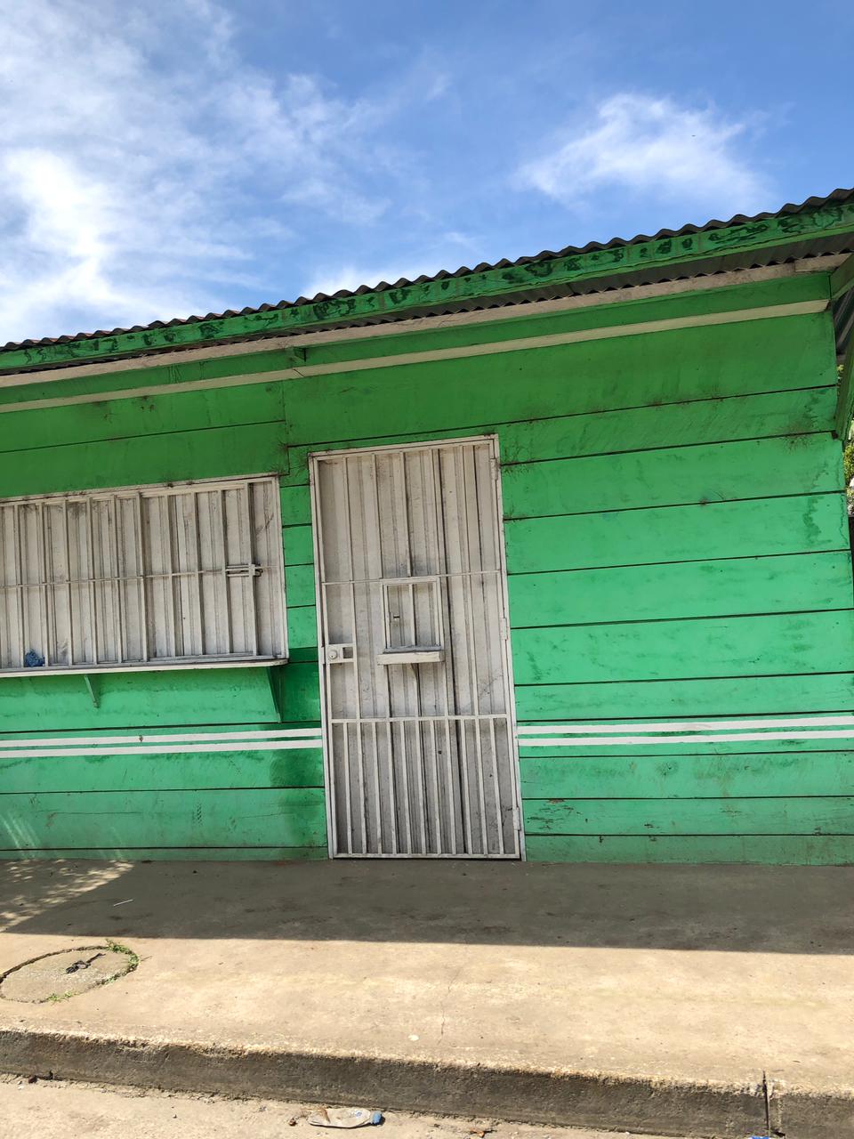 Colorful wooden house in a village