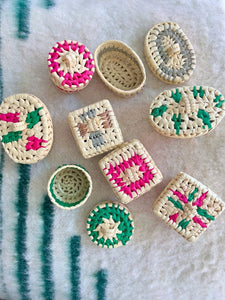 Collection of small woven palm baskets