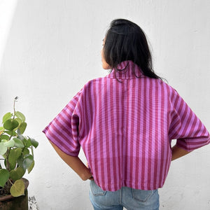 Person wearing Two Shades of pink striped cropped jacket 