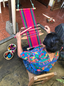 Lady weaving 